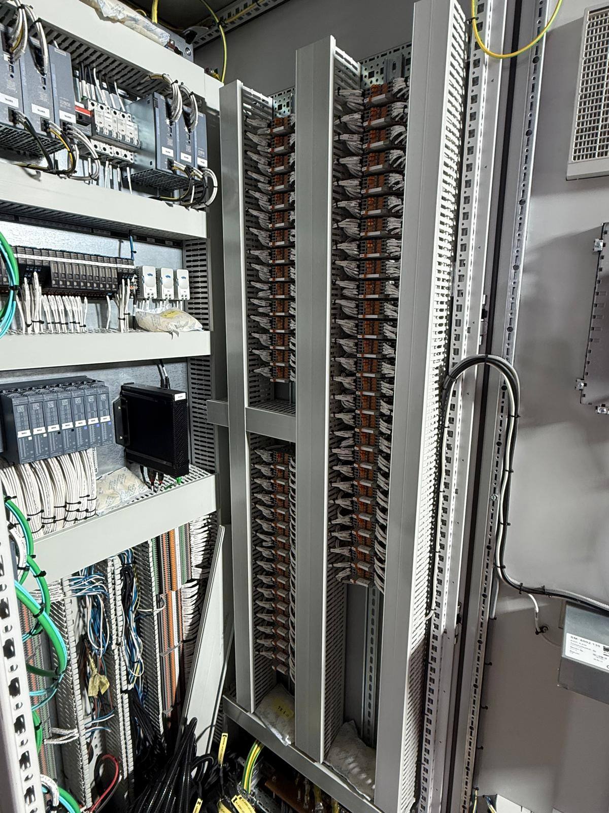 Control panel with two vertical columns of interface relays and push-in terminals for field signal marshalling